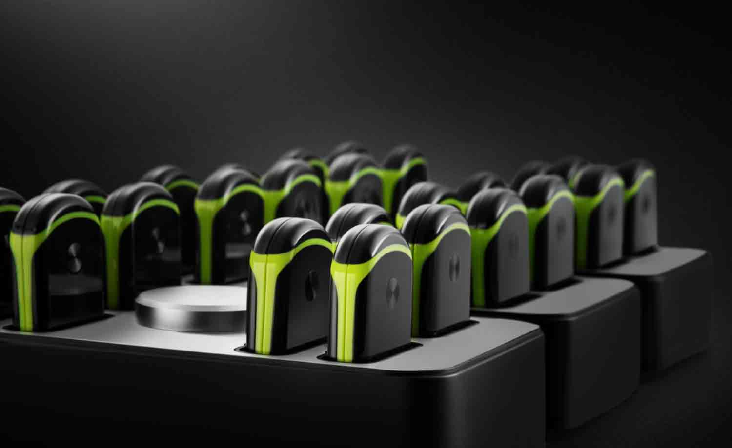 Gengee professional performance tracking system featuring multiple player trackers placed in a docking station for high-precision Local Positioning System (LPS) analytics.